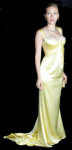 Different pictures of the great american actress Scarlett Johansson, posing sexy with a stunning golden dress.