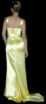 Different pictures of the great american actress Scarlett Johansson, posing sexy with a stunning golden dress.
