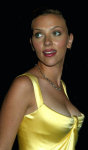 Different pictures of the great american actress Scarlett Johansson, posing sexy with a stunning golden dress.