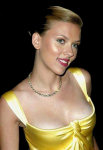 Different pictures of the great american actress Scarlett Johansson, posing sexy with a stunning golden dress.