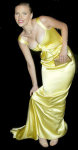 Different pictures of the great american actress Scarlett Johansson, posing sexy with a stunning golden dress.